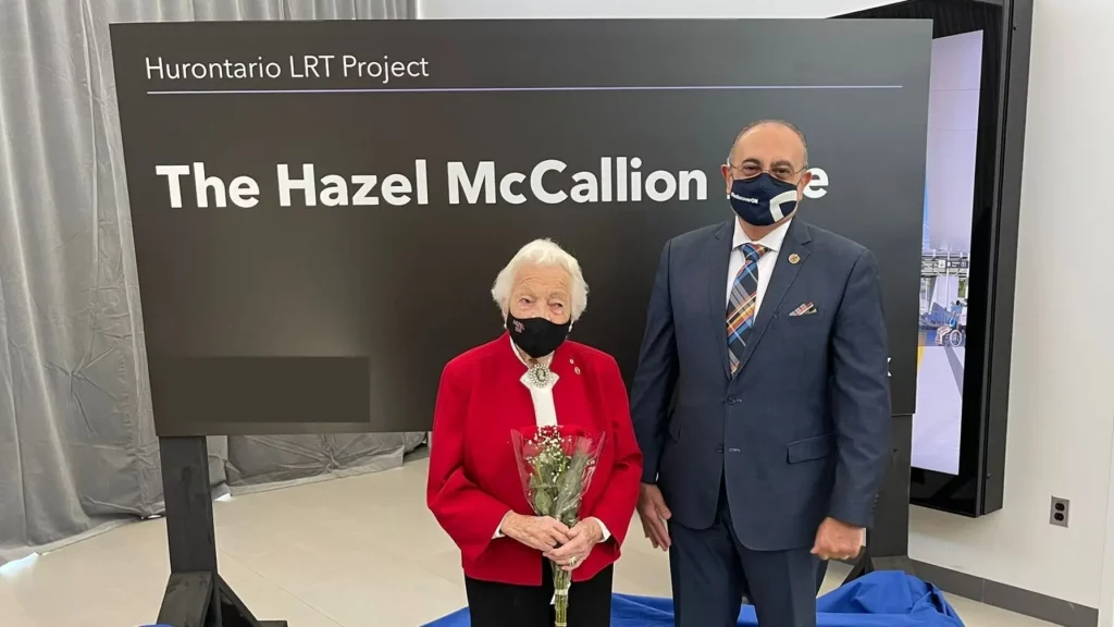 MPP Sheref Sabawy and former Mayor Hazel McCallion stand beside a sign that reads, "Hurontario LRT Project, the Hazel McCallion Line"
