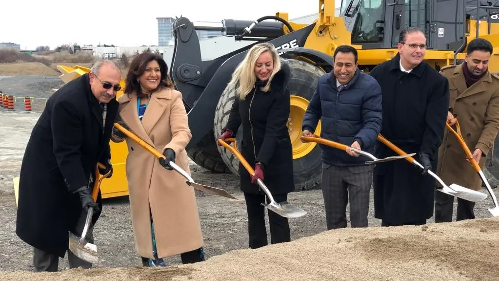 MPP Sabawy and other MPPs from Mississauga, Brampton, and Etobicoke ceremoniously shovel dirt to begin construction on a highway project.
