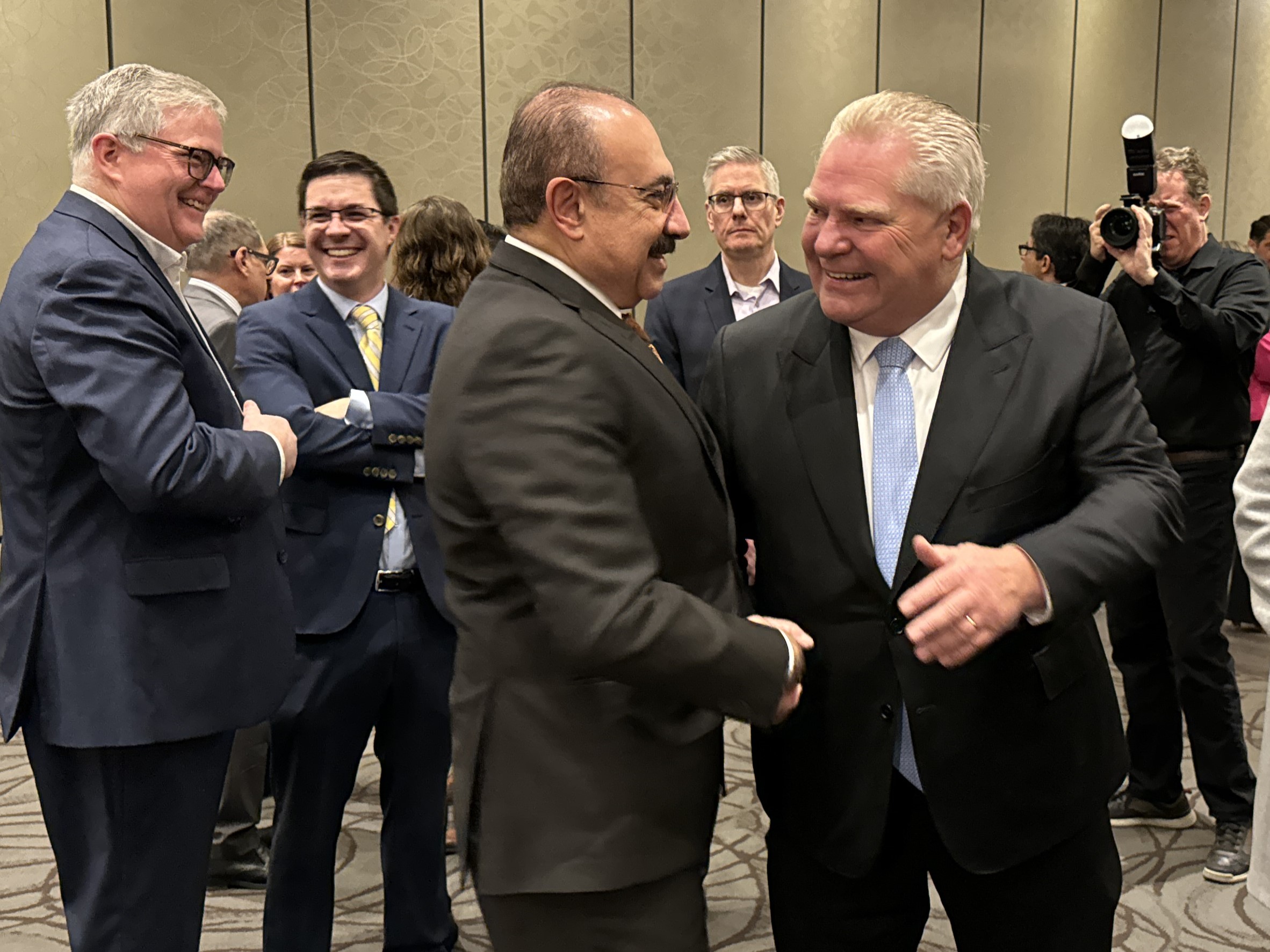 MPP Sabawy and Premier Ford shake hands before a major announcement at the Mississauga Board of Trade on February 8, 2024.
